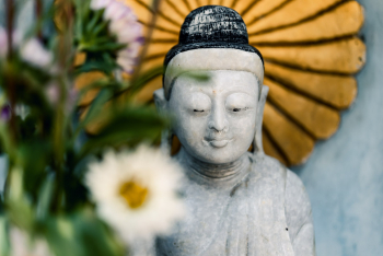 Buddha Statue With Flower