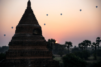 Balloons Rise In The Morning Over The Temples Of Bagan, Myanmar
